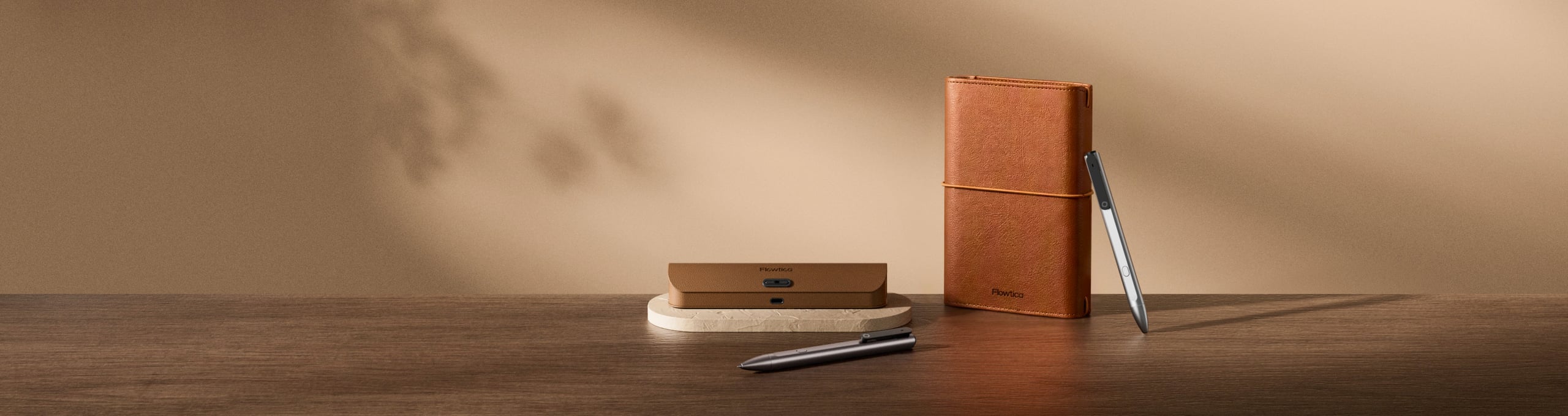 Flowtica Scribe, Folio and leather case on a wooden desk